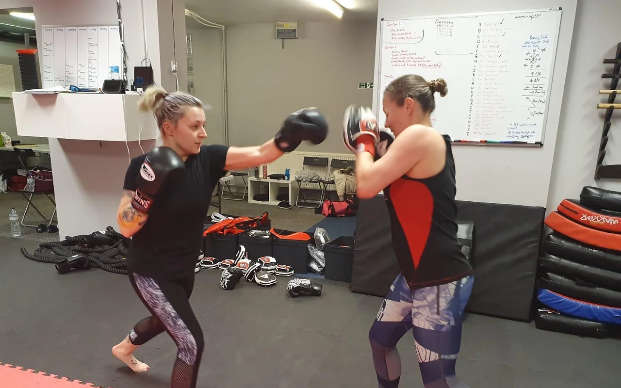 Kickboxing students training together inside the SKMA academy
